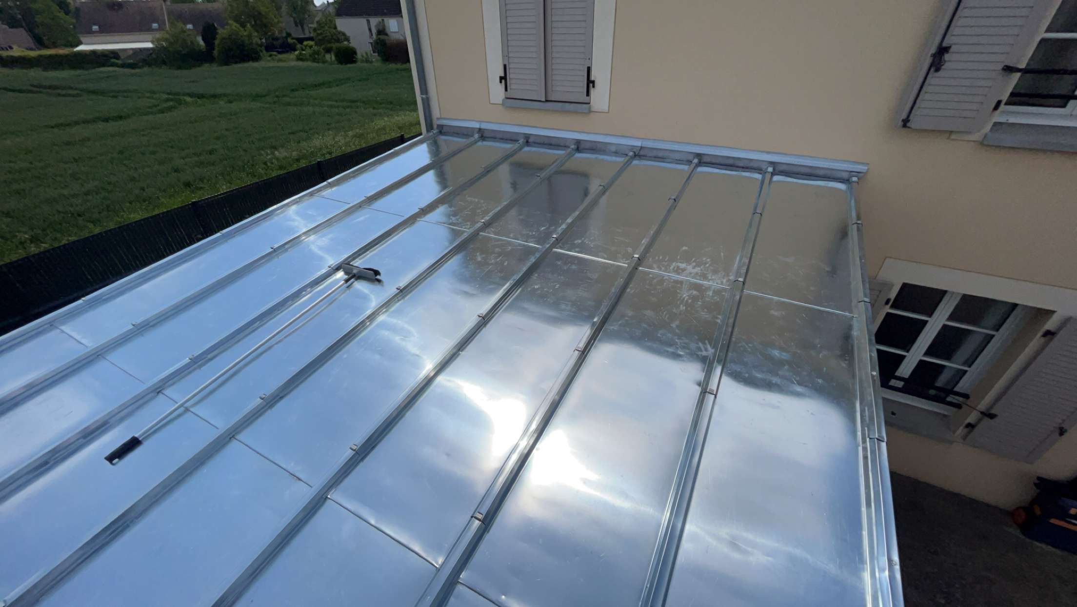 <a href="#ancrage5">Pose de toiture en Zinc </a>